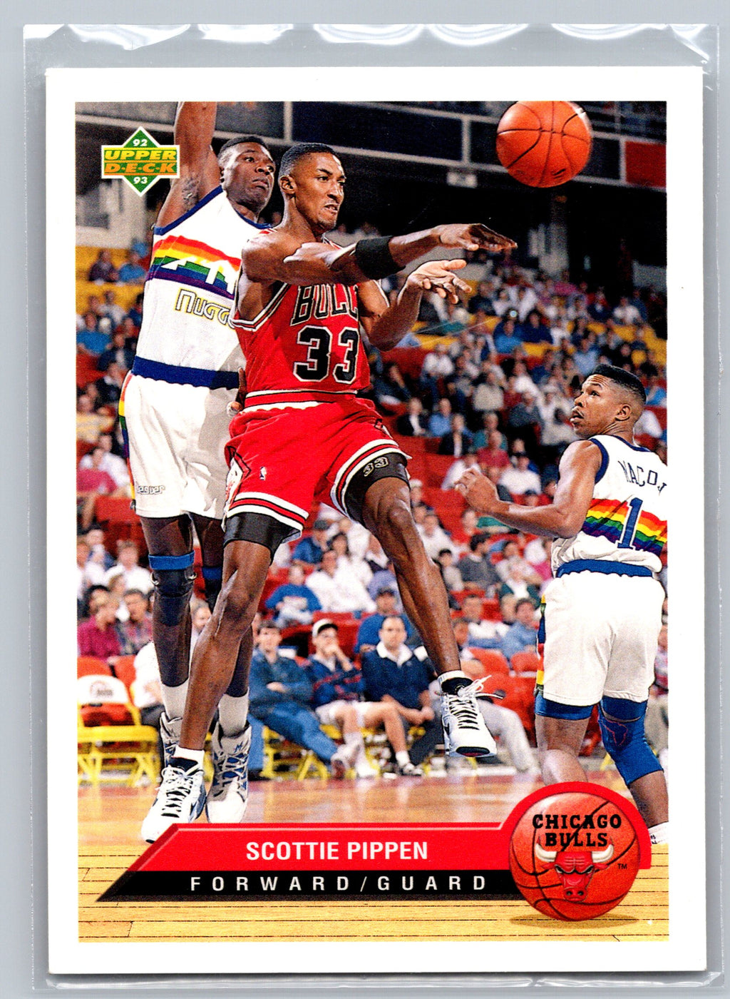 Basketball trading card featuring Scottie Pippen in action with a crowd in the background