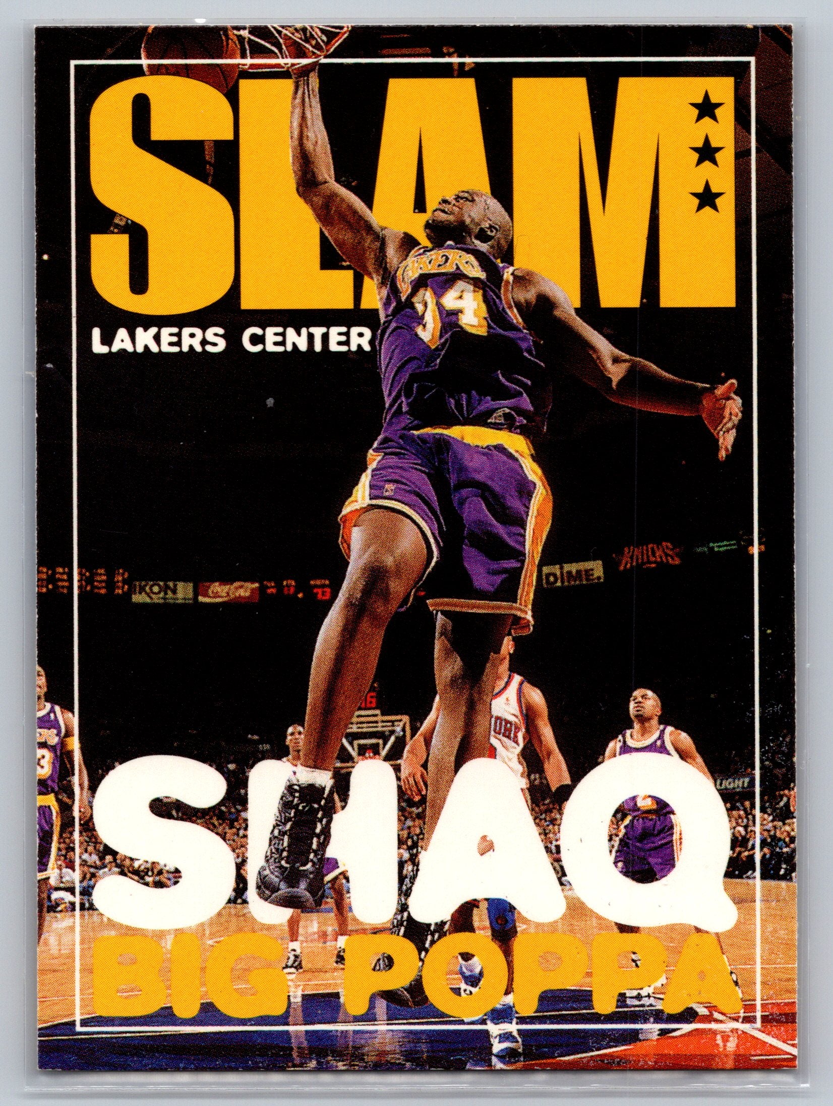 SLAM magazine cover featuring Shaquille O'Neal basketball player in action with 'Lakers Center' text.