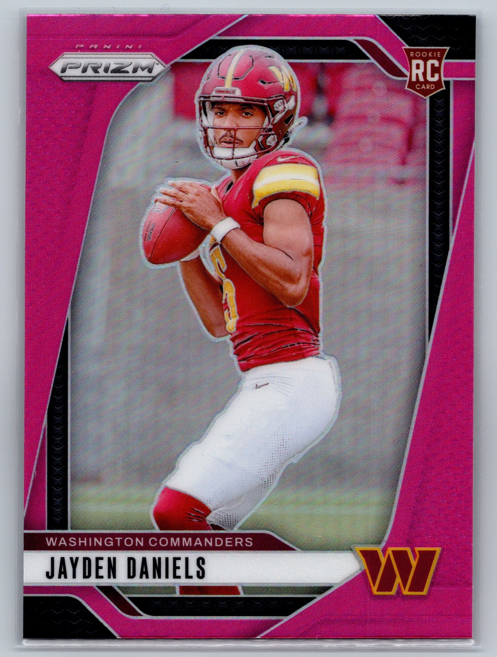 Football trading card of Jayden Daniels for the Washington Commanders with pink border and Prizm logo.
