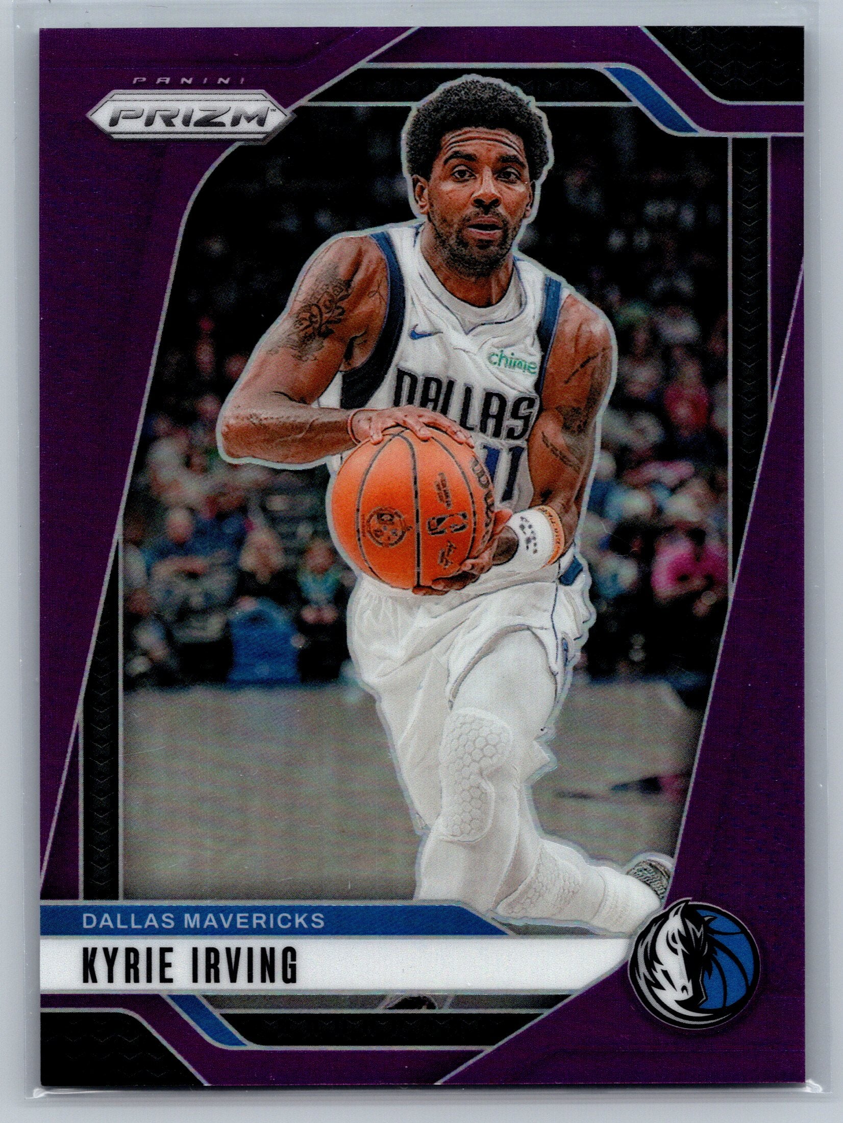 Basketball trading card of Kyrie Irving with a purple border and Dallas Mavericks logo.